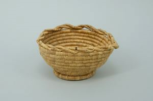 Image: coiled grass basket with scalloped edge